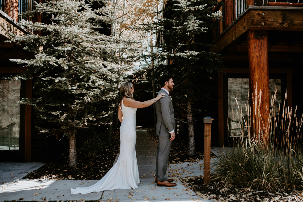 Rustic Inn Wyoming Wedding First Look with Bride and Groom