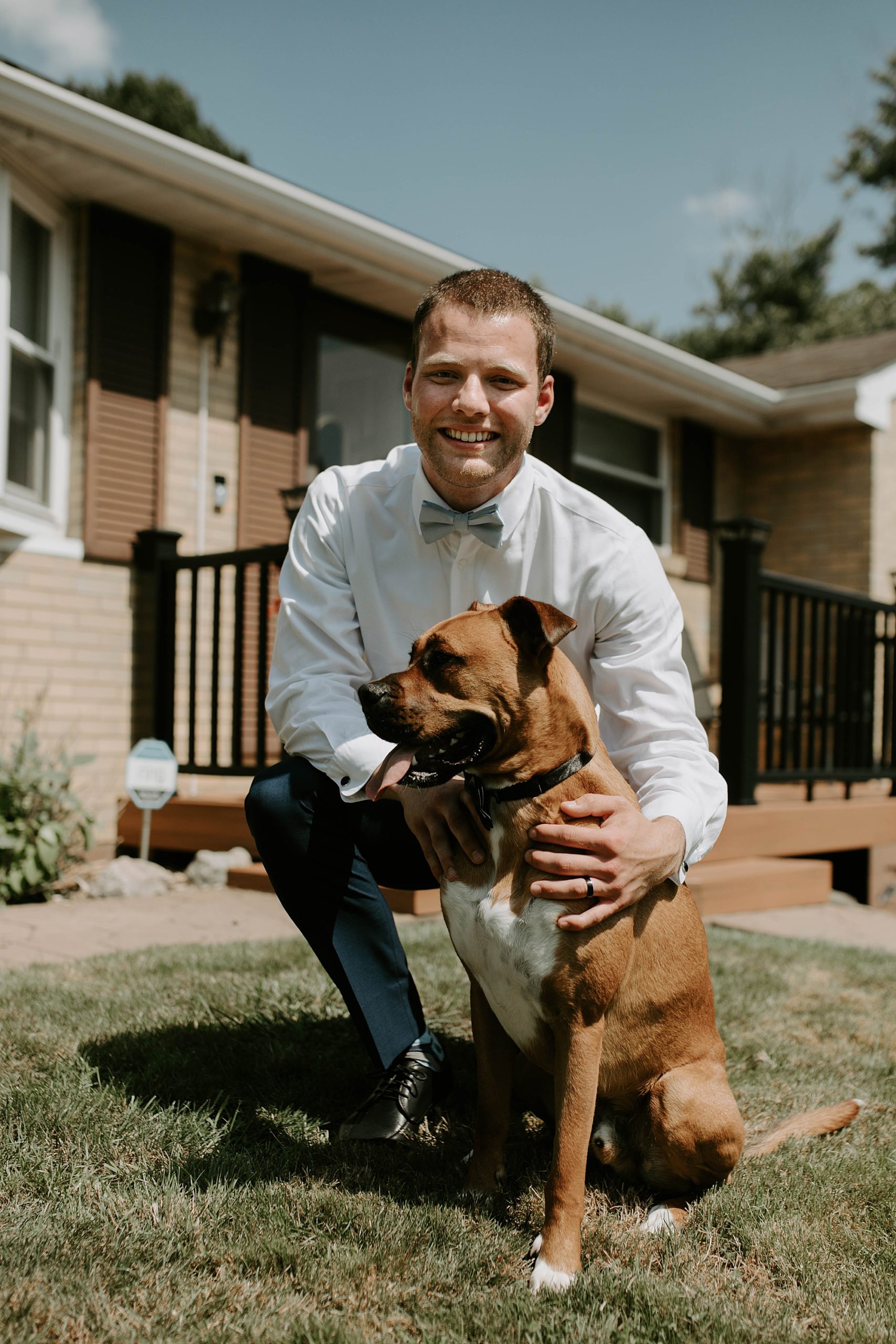 groom photo with dog