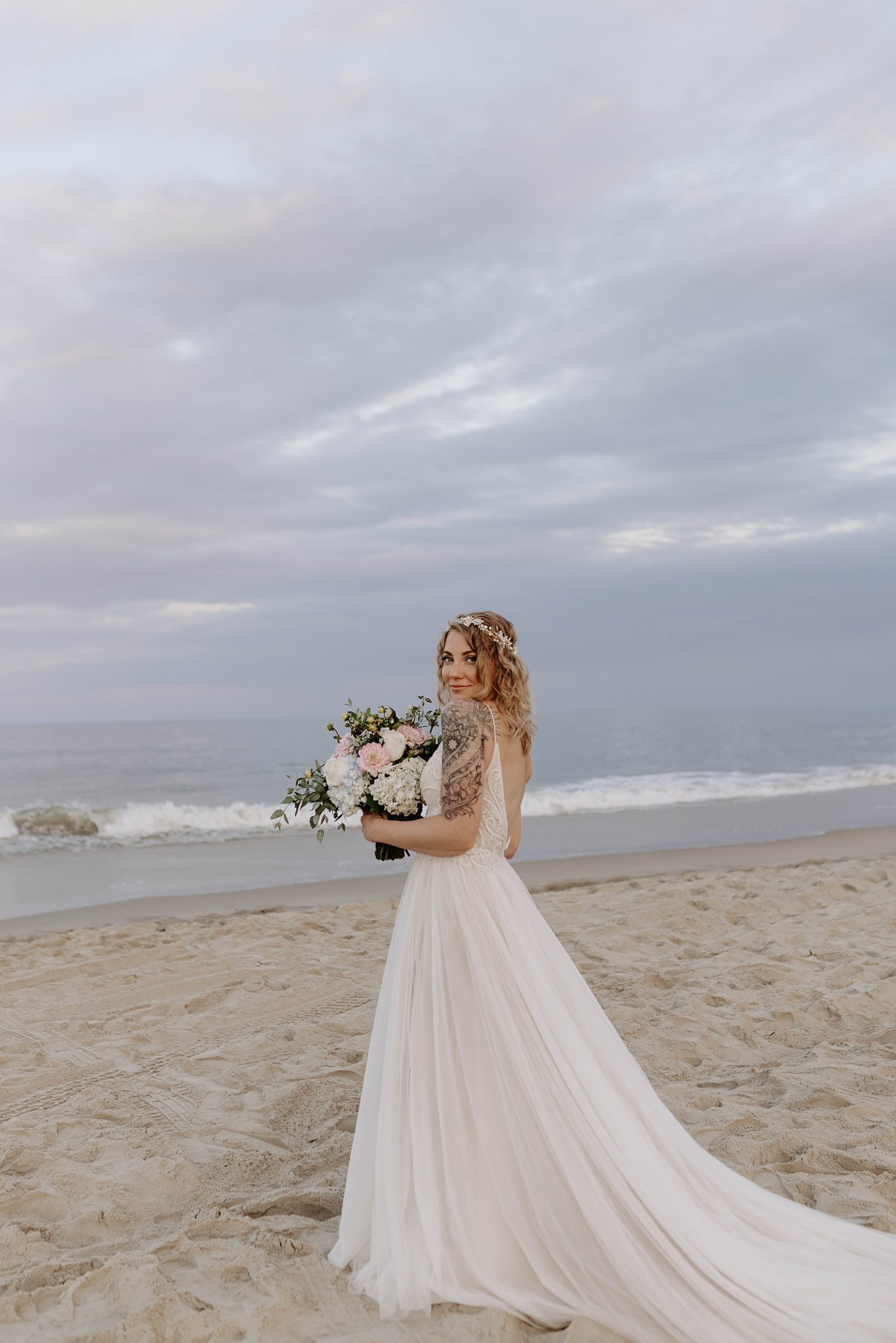 bridal portraits,outer banks wedding, oceanfront VRBO, 4X4 beach